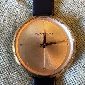 Rose gold and purple Michael Kors watch